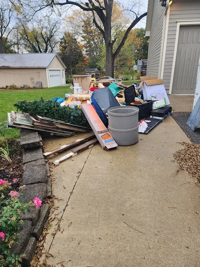 Dumpster being loaded with debris for Residential Dumpster Rental in Lithopolis